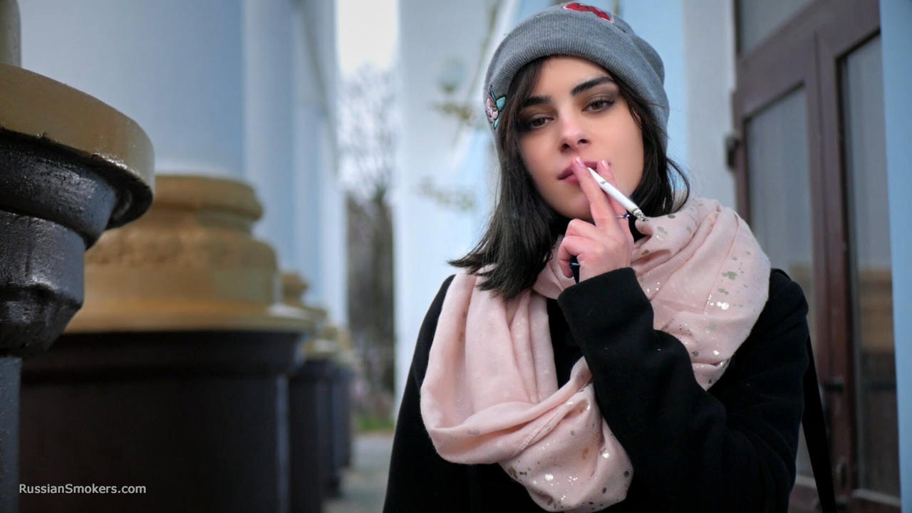 Clipspool | Sweet Karina is smoking 100 mm cigarette in this fetish