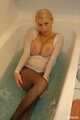 Busty Anna takes a hot bath in her pantyhose 6